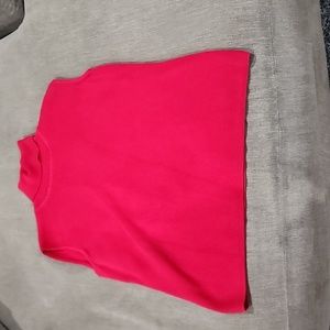 Red ribbed sleeveless turtleneck